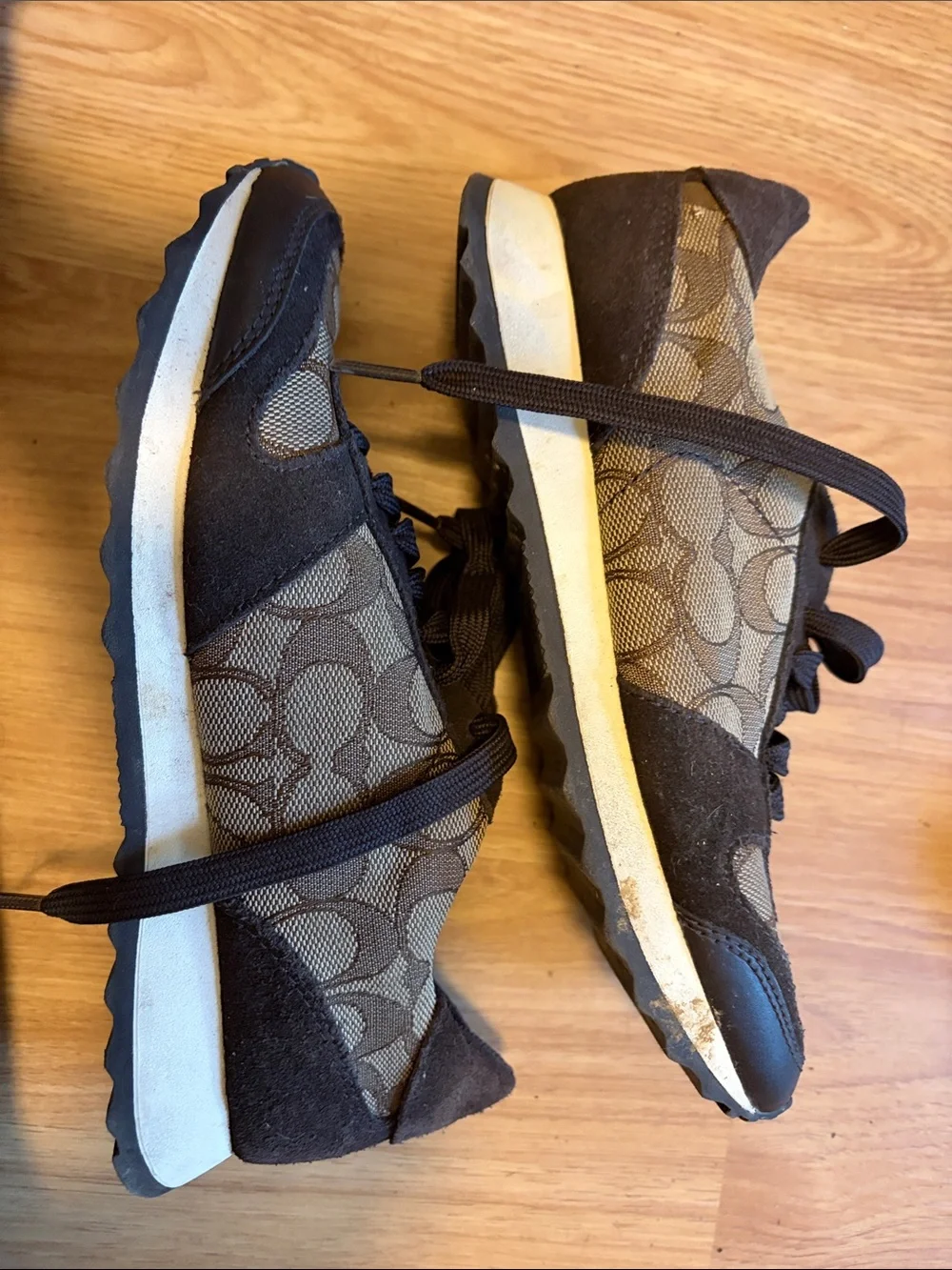 Coach women’s Dark Brown Signature Logo Lace-Up Sneakers